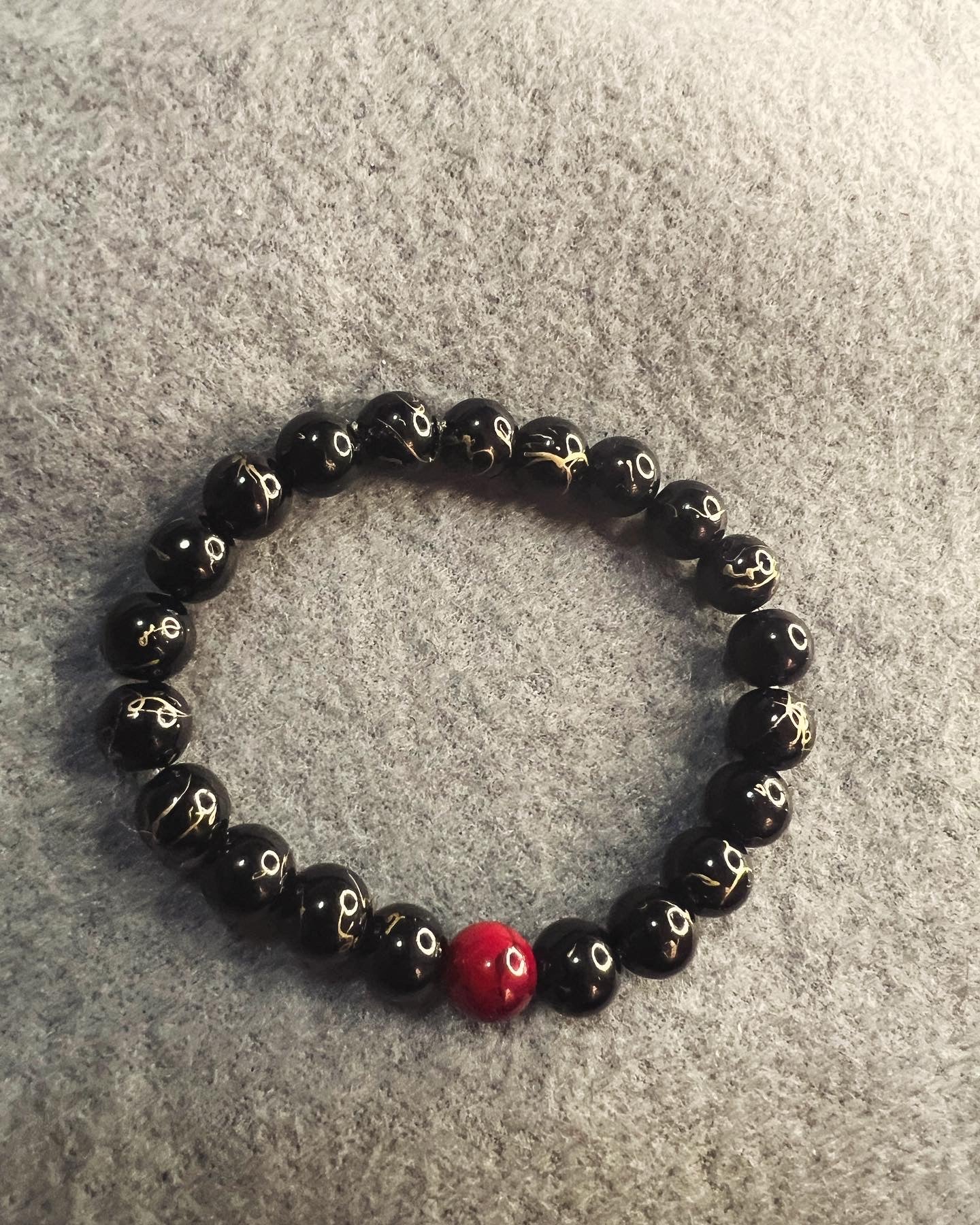 Black Jasper and Dyed Quartz Red bracelets