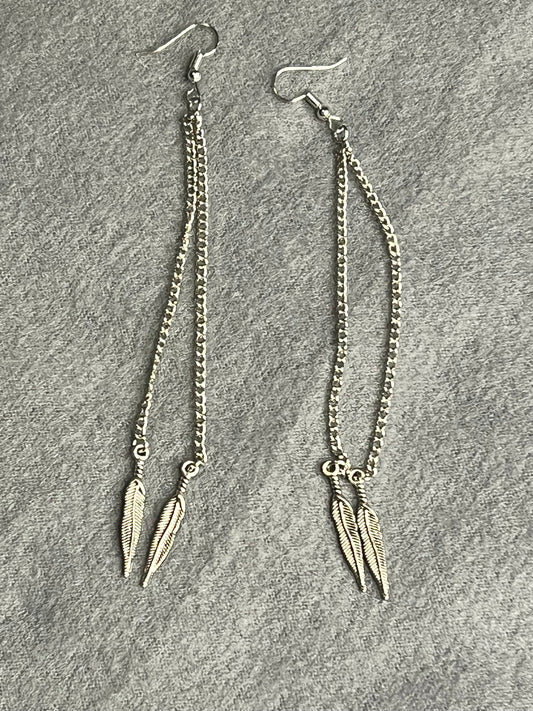 Dangling silver feathers Earrings