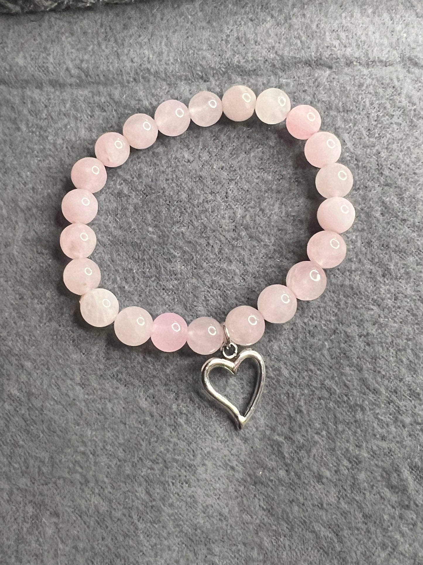 Rose Quartz Beaded Bracelet With Heart Charm.