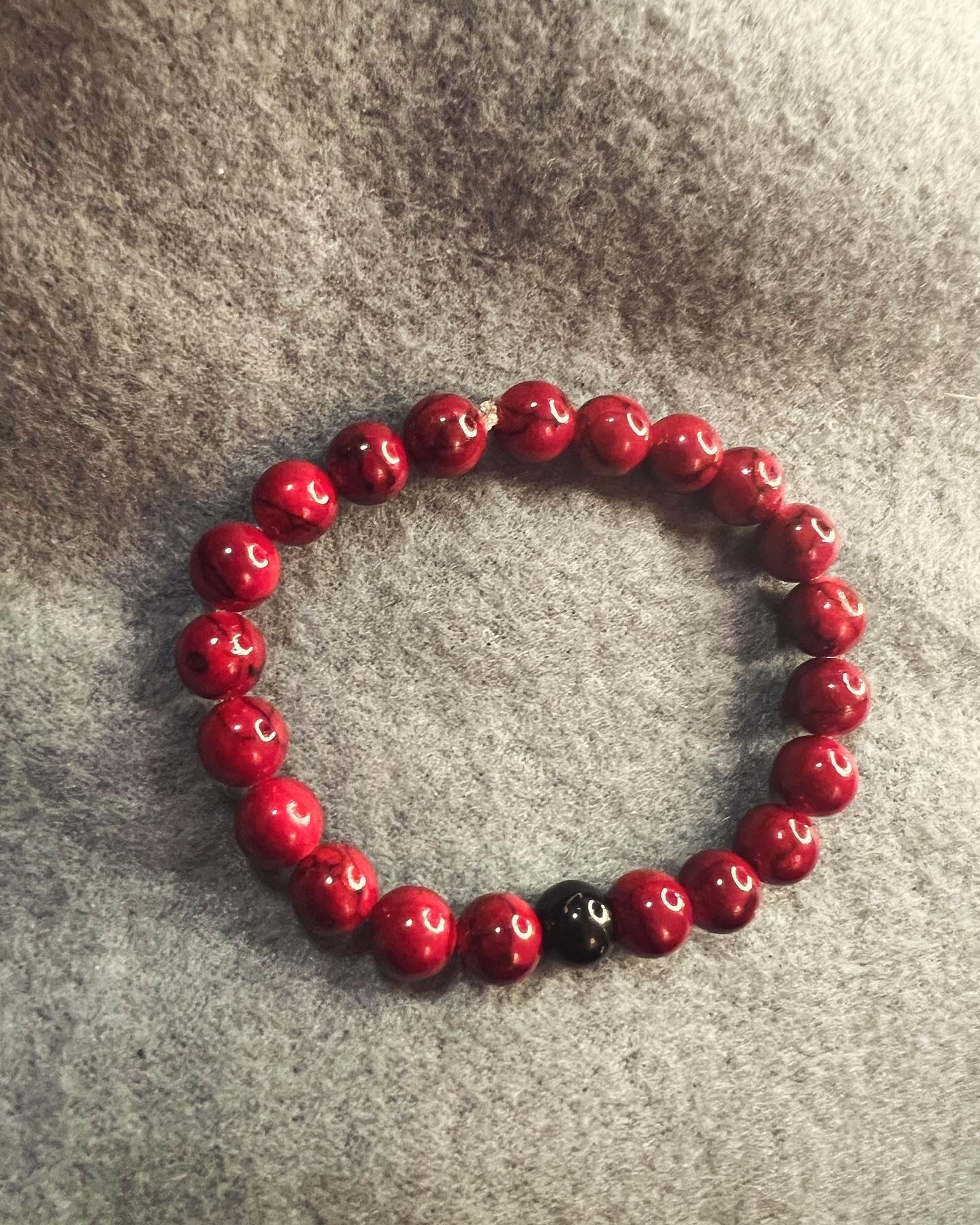 Black Jasper and Dyed Quartz Red bracelets